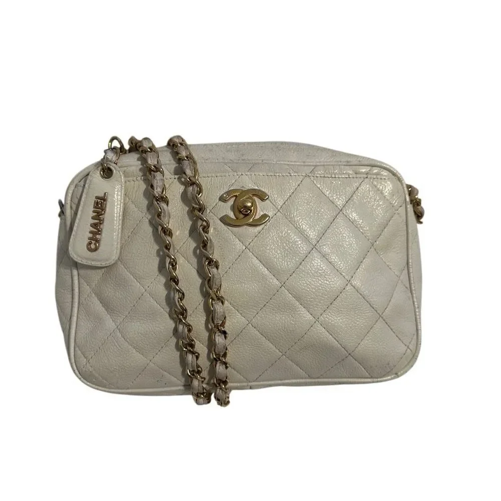 Chanel beige quilted gold tone leather crossbody bag